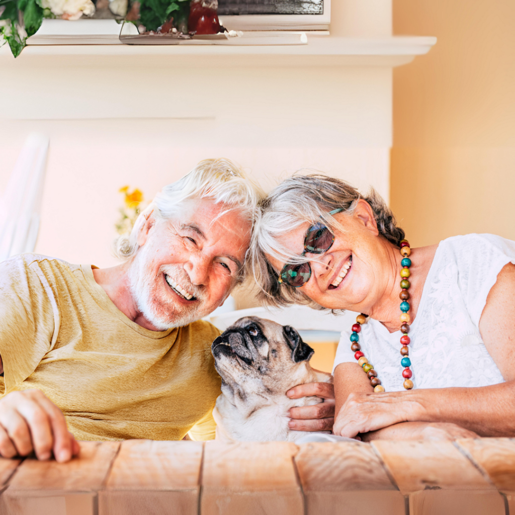 Happy hispanic couple in Florida with their dog
